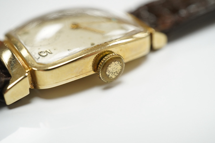 A gentleman's 14k Lord Elgin manual wind wrist watch, with Arabic dial and subsidiary seconds, case diameter 25mm, on an associated leather strap. Condition - poor